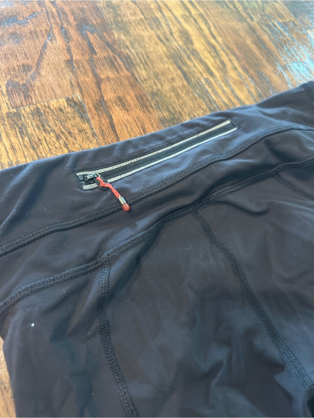 lululemon athletica Black Leggings with Red Zipper Pull